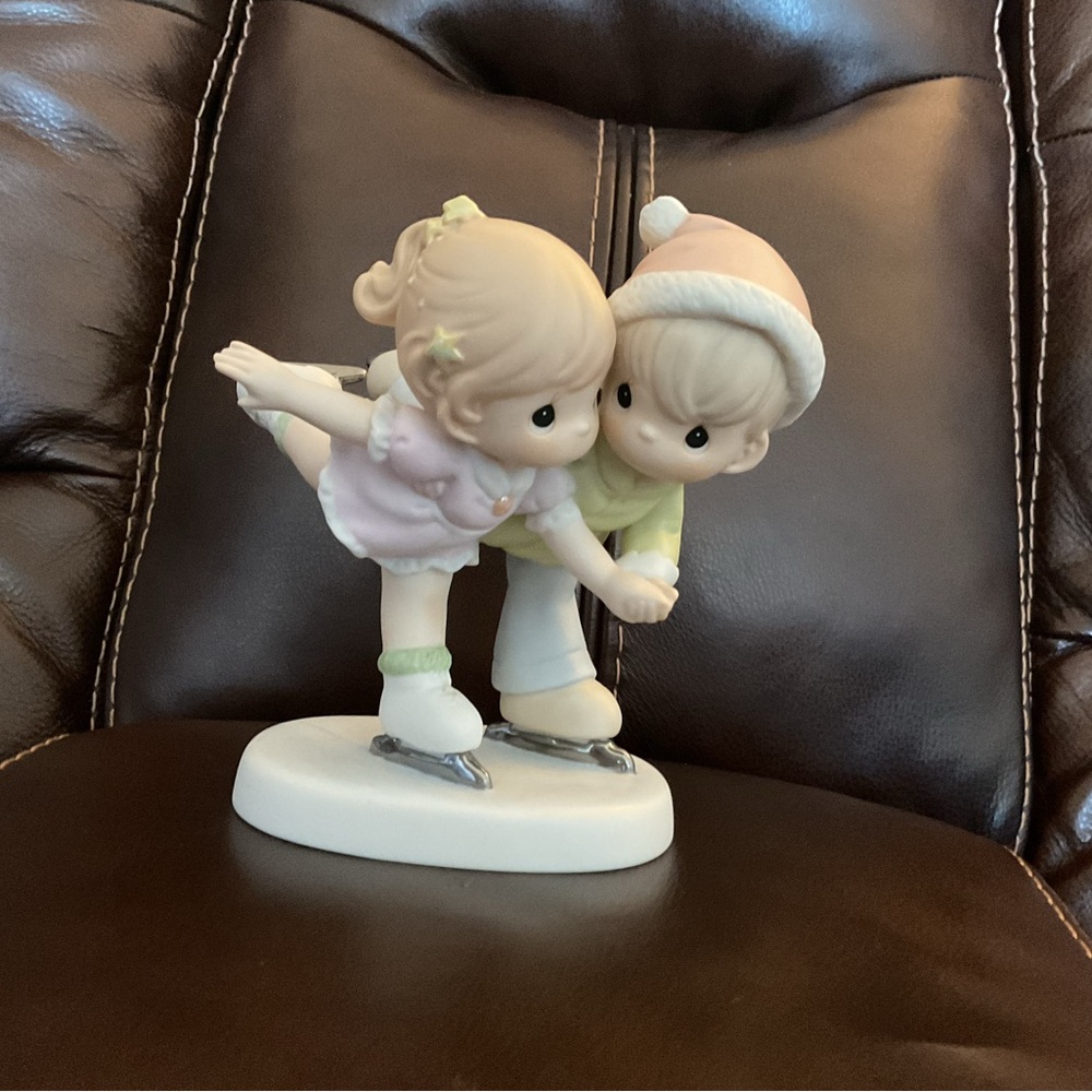 Precious Moments SHARING OUR WINTER WONDERLAND figurine. Like new.